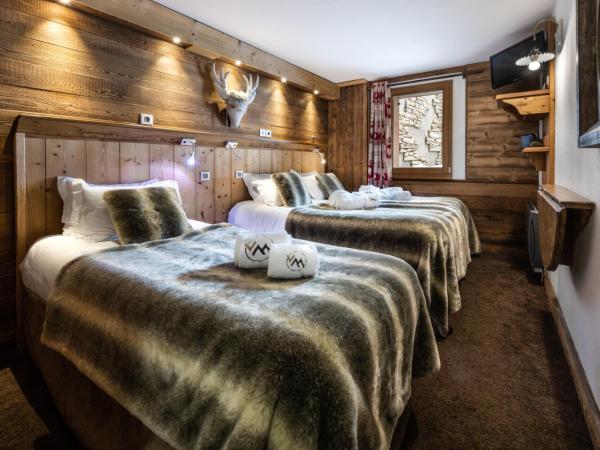 Hôtel Ski Lodge - Village Montana : photo 1 de la chambre chambre triple sans balcon