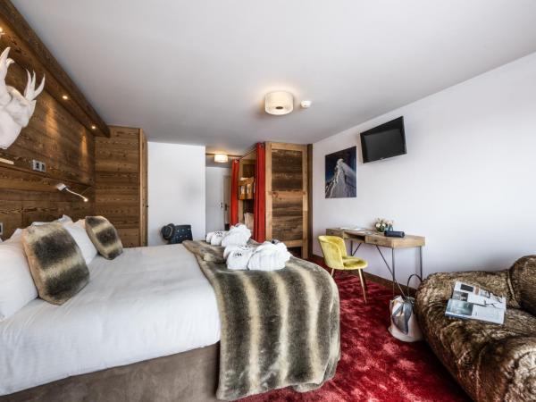 Hôtel Ski Lodge - Village Montana : photo 1 de la chambre chambre quadruple avec balcon pour 3 adultes (13 ans et plus)