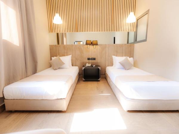 Ennesma Hotel : photo 2 de la chambre chambre lits jumeaux
