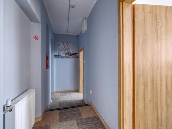 Noclegi pokoje gościnne Żeglarz : photo 3 de la chambre chambre quadruple