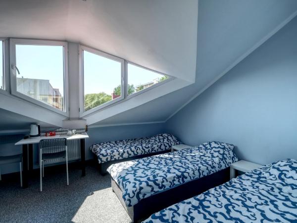 Noclegi pokoje gościnne Żeglarz : photo 3 de la chambre chambre quadruple