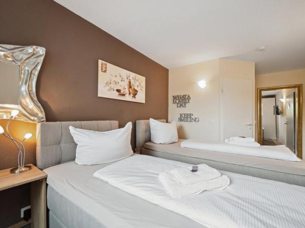 7o'Clock - Hannover Laatzen : photo 4 de la chambre chambre double ou lits jumeaux