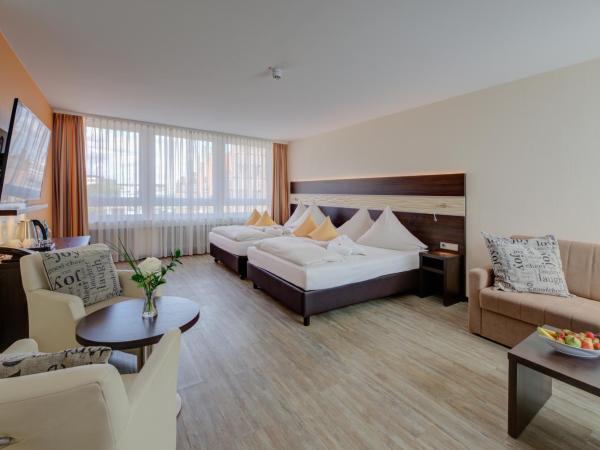 Concorde Hotel am Leineschloss : photo 1 de la chambre chambre lits jumeaux