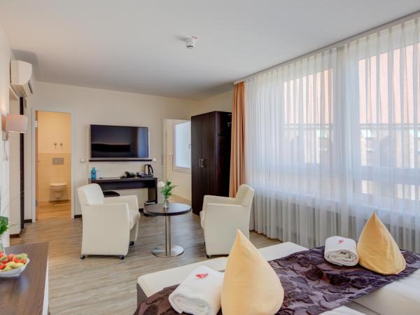 Concorde Hotel am Leineschloss : photo 9 de la chambre chambre double supérieure