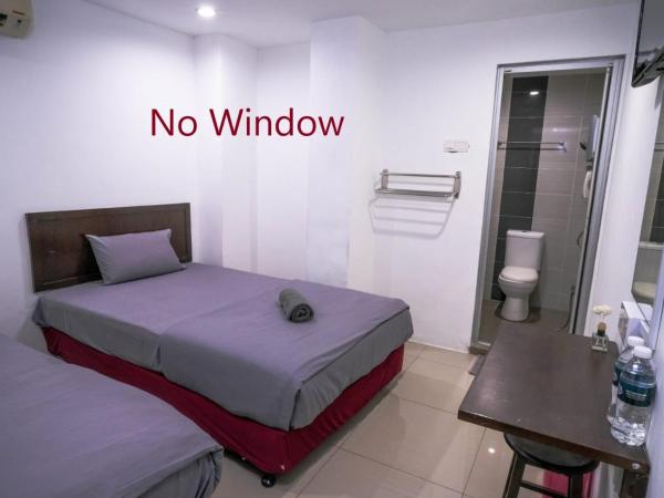 Heritage Inn : photo 1 de la chambre chambre lits jumeaux avec salle de bains privative