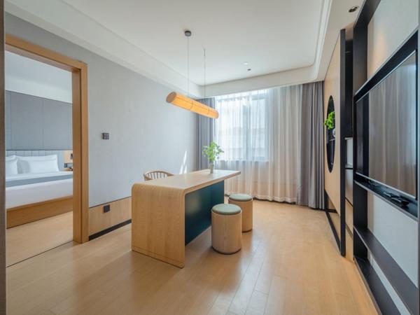 Pero Hotel Qingdao Expo City : photo 1 de la chambre suite exécutive