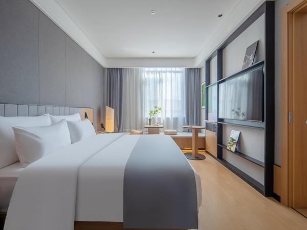 Pero Hotel Qingdao Expo City : photo 3 de la chambre suite exécutive