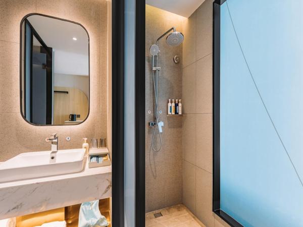 LanOu Hotel Qingdao West Station Haixi Road : photo 2 de la chambre chambre lits jumeaux deluxe