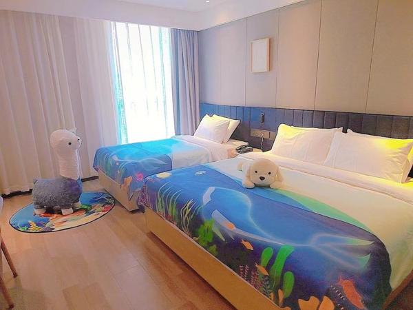 LanOu Hotel Qingdao West Station Haixi Road : photo 1 de la chambre chambre familiale 