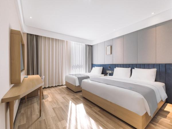 LanOu Hotel Qingdao West Station Haixi Road : photo 5 de la chambre chambre familiale deluxe