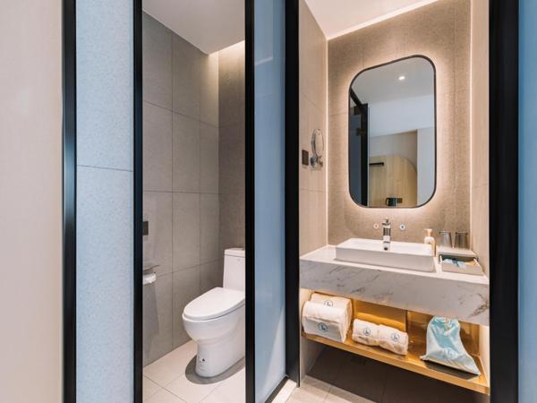 LanOu Hotel Qingdao West Station Haixi Road : photo 2 de la chambre chambre double deluxe