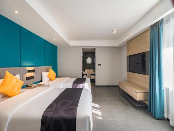 Feronia Hotel Beijing Bird's Nest Datun Road : photo 1 de la chambre chambre lits jumeaux