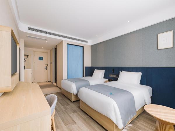 LanOu Hotel Qingdao West Station Haixi Road : photo 6 de la chambre chambre lits jumeaux deluxe