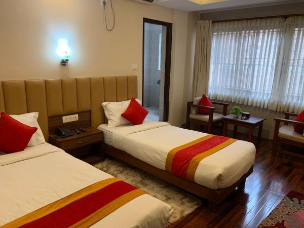 Redstone Regency Hotel : photo 1 de la chambre chambre lits jumeaux deluxe