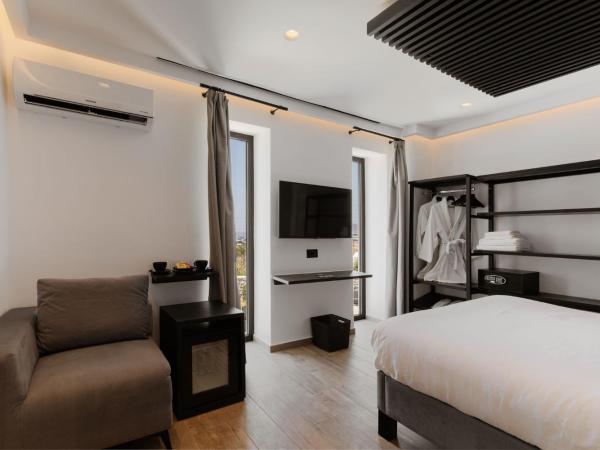 Mazera Boutique Hotel : photo 10 de la chambre chambre lit king-size avec baignoire spa