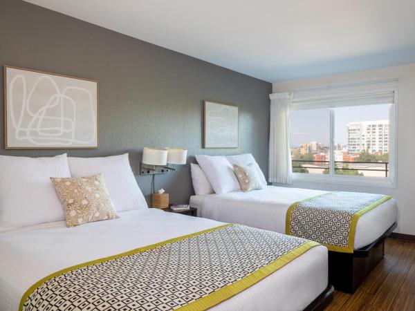 Park Lane Suites & Inn : photo 1 de la chambre chambre quadruple