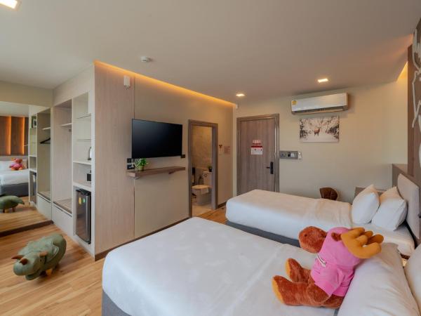 Moose Hotel Chiangmai : photo 2 de la chambre chambre lits jumeaux avec douche 