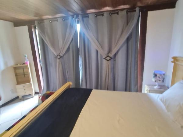 Pousada Mar'Tito Forno : photo 2 de la chambre chambre triple