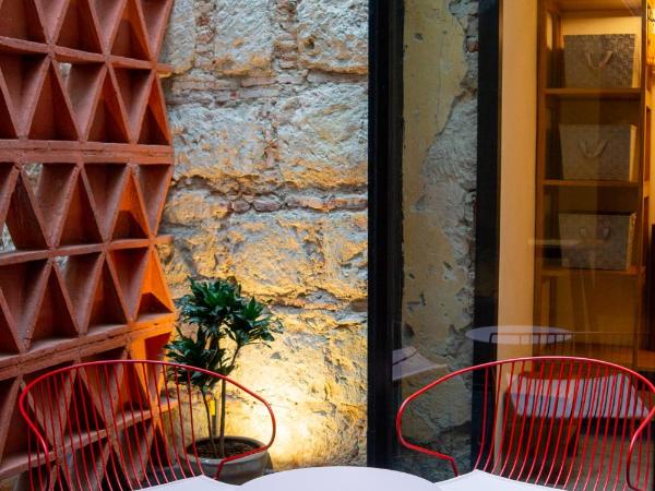 Casa Antonieta : photo 2 de la chambre suite with two queen beds and inner patio