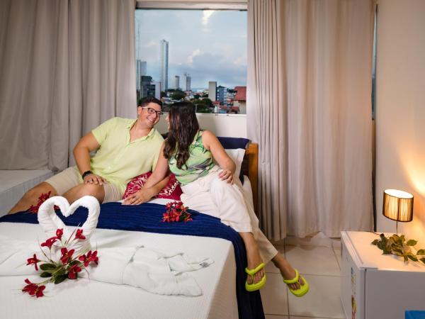 Pousada Flor de Ponta Negra : photo 2 de la chambre chambre quadruple - vue sur jardin