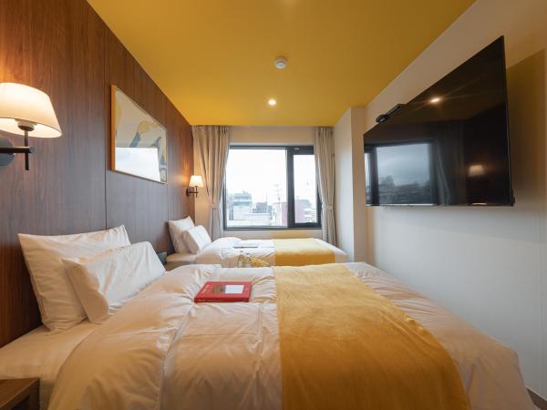 Nouvelle Hotel Seoul Itaewon : photo 2 de la chambre chambre lits jumeaux deluxe