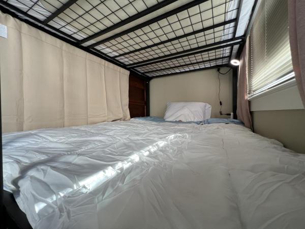 MyCrib Houston Hostel : photo 7 de la chambre lit superposé dans dortoir mixte