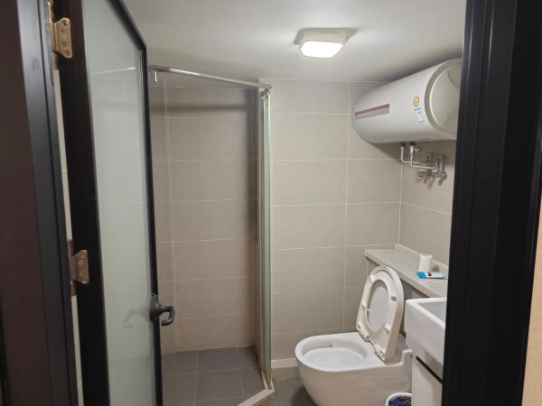 Xinghe Times Apartment - Shenzhen North Railway Station : photo 2 de la chambre suite familiale