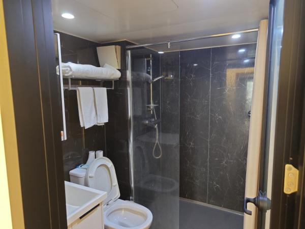 Xinghe Times Apartment - Shenzhen North Railway Station : photo 4 de la chambre suite familiale