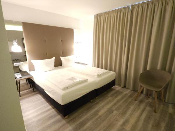 Hotel Amadeus : photo 3 de la chambre chambre double standard