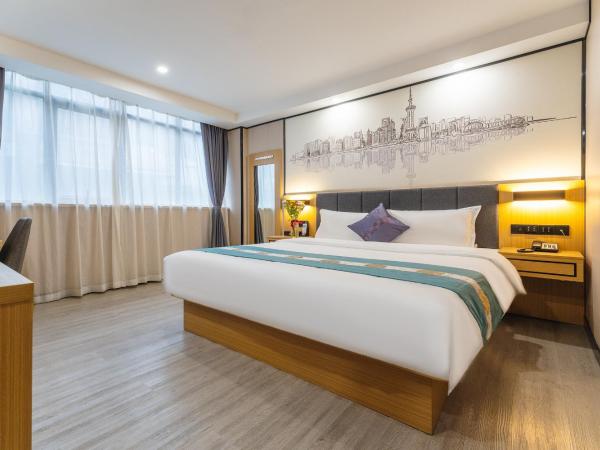 Amemouillage Inn - Guangzhou Railway Station Xicun Metro Station : photo 1 de la chambre chambre lit queen-size deluxe