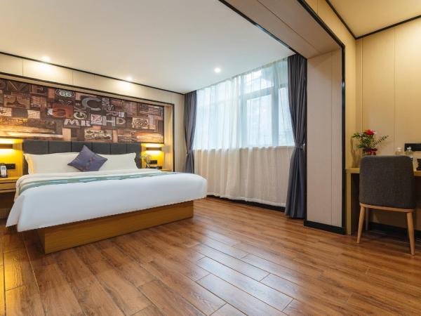 Amemouillage Inn - Guangzhou Railway Station Xicun Metro Station : photo 1 de la chambre chambre affaires lit queen-size