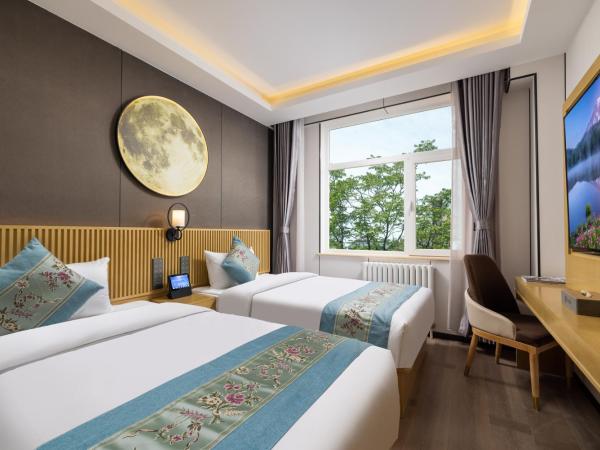 East Sacred Hotel - very close to the Drum tower And Nanluoguxiang Houhai Bar Very close to the bird's nest water cube : photo 2 de la chambre chambre lits jumeaux deluxe