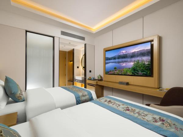 East Sacred Hotel - very close to the Drum tower And Nanluoguxiang Houhai Bar Very close to the bird's nest water cube : photo 3 de la chambre chambre familiale deluxe