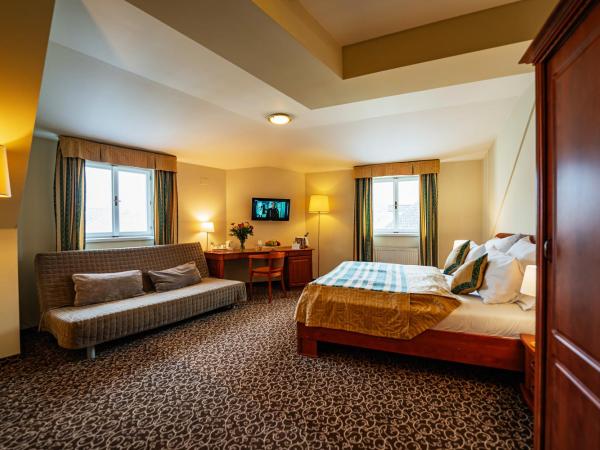 Hotel U Divadla - Czech Leading Hotels : photo 2 de la chambre chambre deluxe double ou lits jumeaux