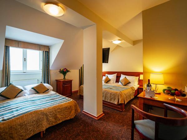 Hotel U Divadla - Czech Leading Hotels : photo 3 de la chambre chambre quadruple