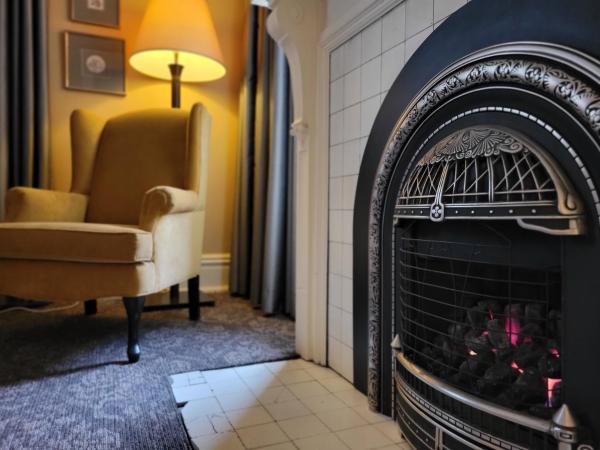 Mansions on Fifth : photo 8 de la chambre suite de luxe avec lit king-size - canapé-lit