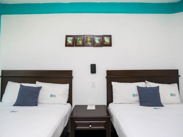 Pa´Xa Mama Hotel Boutique : photo 9 de la chambre chambre double avec 2 lits doubles