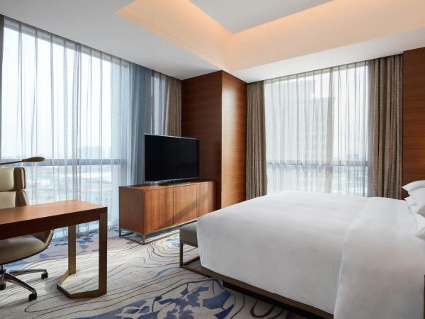 Sheraton Beijing Lize Hotel : photo 4 de la chambre belle suite 1 chambre lit king-size avec accès au salon club