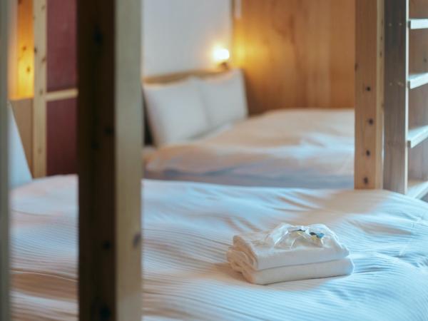 Common de - Hostel & Bar : photo 4 de la chambre chambre familiale deluxe