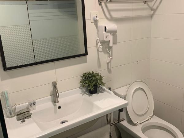 I Garden Hotel : photo 4 de la chambre chambre lit king-size deluxe