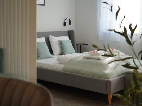 Secret Garden Vendégház : photo 2 de la chambre chambre quadruple premium