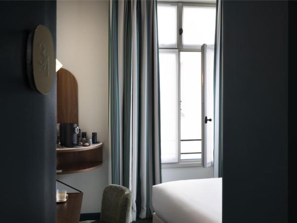 Hotel L de Lutece - Notre-Dame : photo 2 de la chambre chambre deluxe double ou lits jumeaux