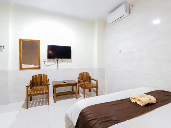 Hotel Safara Yogyakarta : photo 4 de la chambre chambre triple deluxe