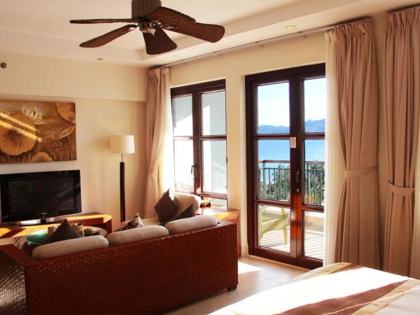 Aegean Suites Sanya Yalong Bay Resort : photo 3 de la chambre studio deluxe avec cuisine, ustensiles de cuisine et lave-linge/sèche-linge - vue sur océan