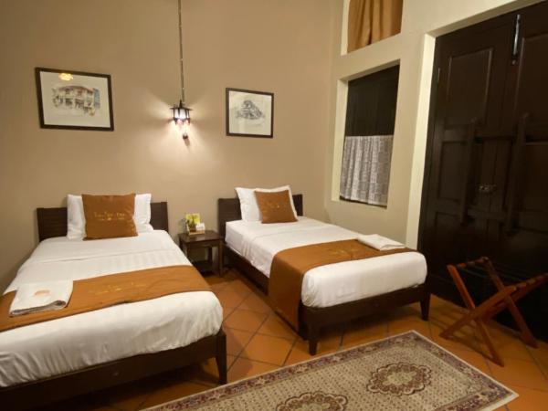 ke-lan-tan House : photo 5 de la chambre chambre lits jumeaux avec salle de bains privative séparée