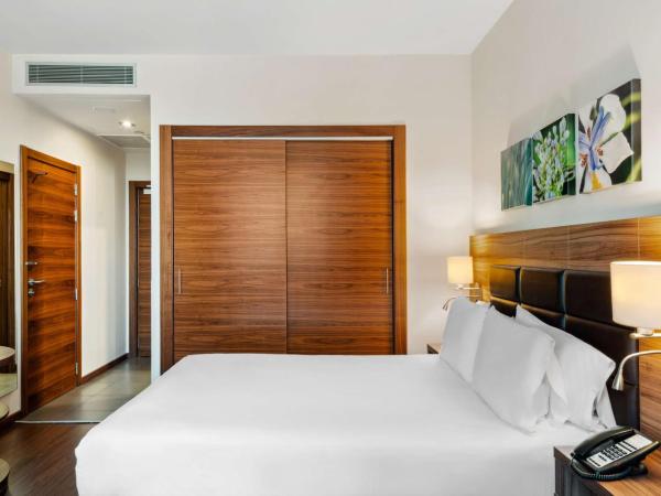 Hilton Garden Inn Sevilla : photo 2 de la chambre chambre lit queen-size 