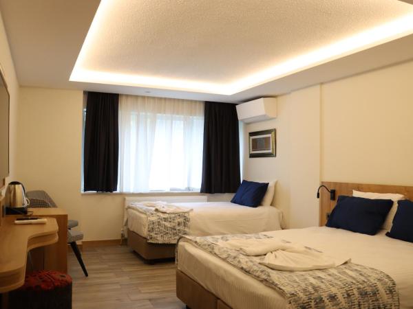 Dab Hotel Ulus : photo 4 de la chambre chambre triple