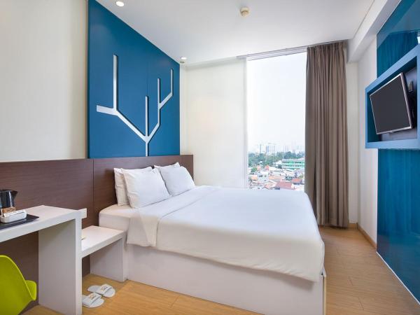 1O1 URBAN Jakarta Pemuda : photo 1 de la chambre chambre lit king-size deluxe