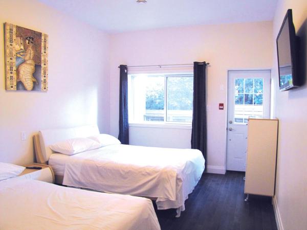 Dragon Gate Inn : photo 4 de la chambre suite de luxe avec 2 lits queen-size