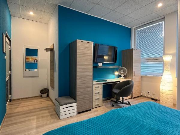 Keja Rooms - Pokoje Noclegi w Centrum Gdyni : photo 4 de la chambre chambre lit king-size